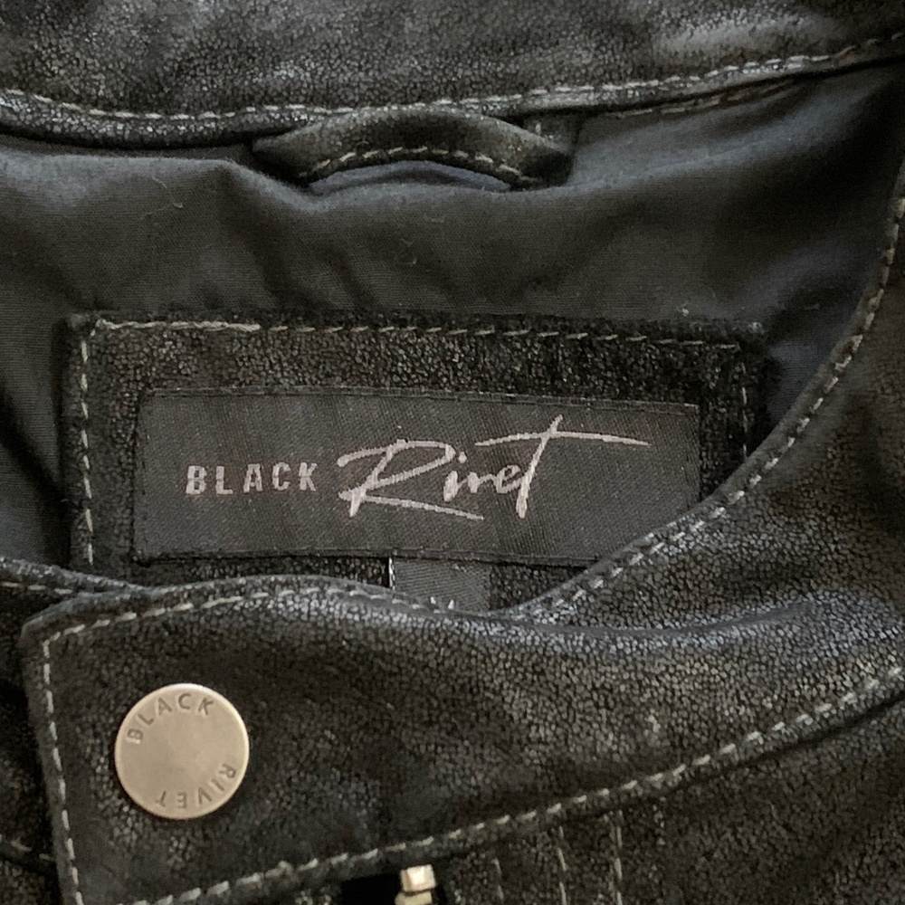 Black rivet jacket in leather
